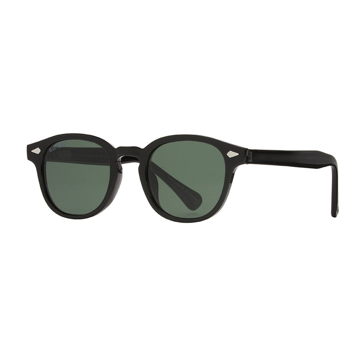 Black sunglasses with green lenses on a white background